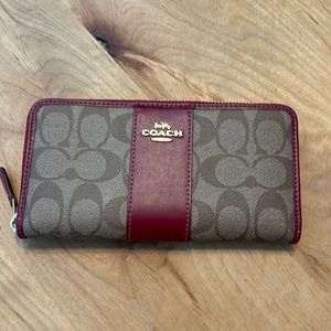 Coach cranberry and taupe wallet. Like new condition.